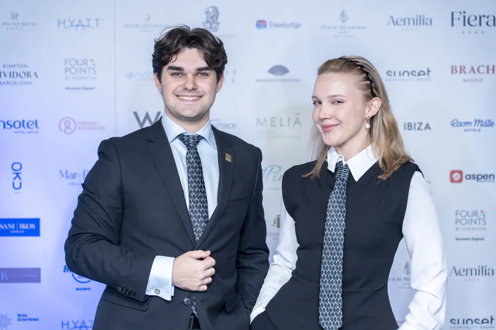 Vatel students in front of the hotel chains wall at the Careers Forum